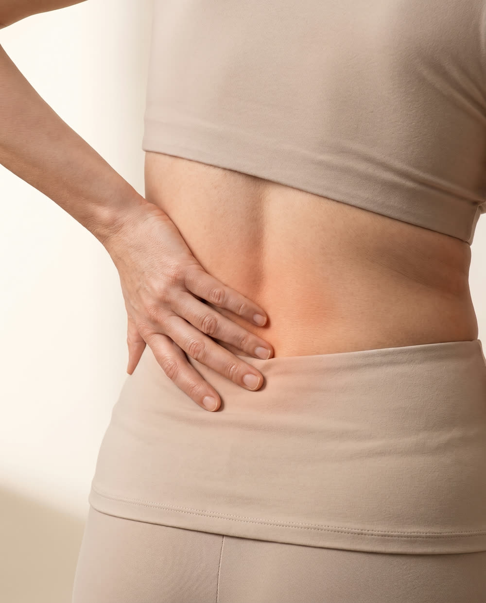 Person experiencing back pain