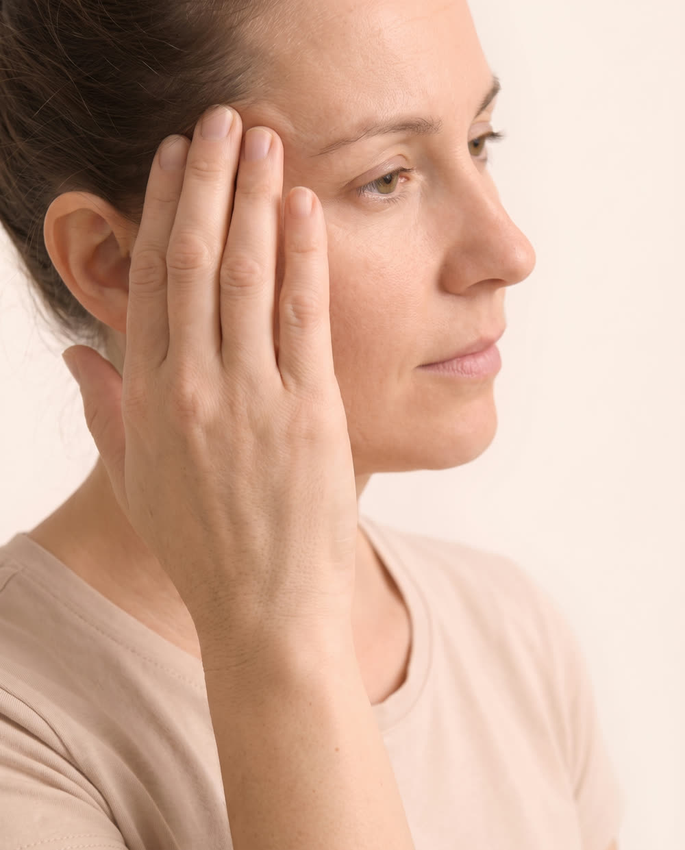 Person experiencing headaches